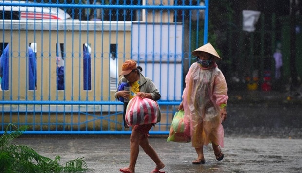 Some Hoi An residents took shelter in a primary school as Typhoon Noru headed towards central Vietnam.