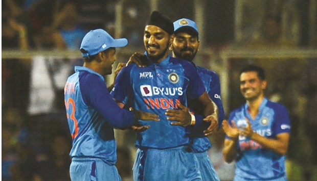 Indiau2019s Arshdeep Singh (centre) celebrates after taking the wicket of South Africau2019s David Miller (not pictured) during the first Twenty20I in Thiruvananthapuram on Wednesday. (AFP)