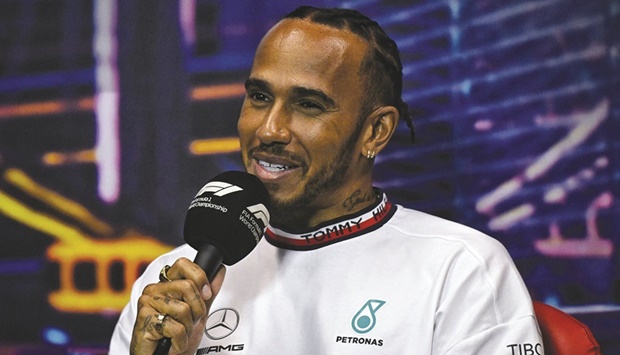 Mercedesu2019 British driver Lewis Hamilton speaks during a pre-event press conference at the Marina Bay Street Circuit in Singapore  yesterday. (AFP)