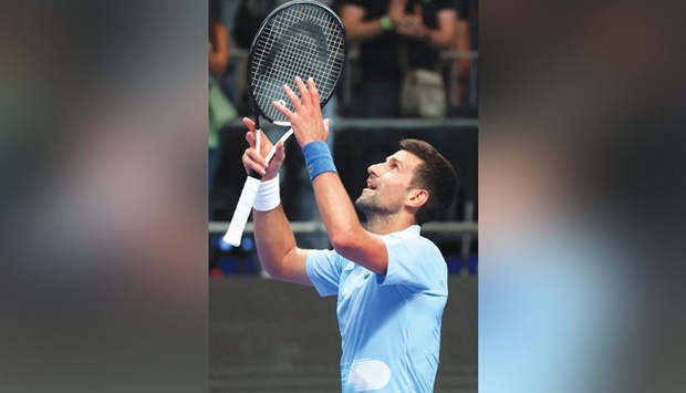 Serbiau2019s Novak Djokovic reacts after  winning his match against Spainu2019s Pablo Andujar at the Watergen Open 2022 in Tel Aviv yesterday. (AFP)