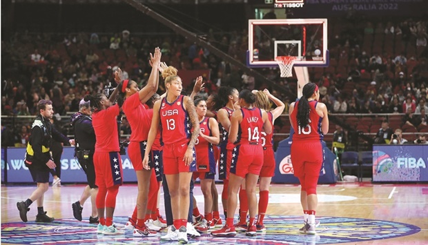 USA players celebrate after their win over Canada in the semi-finals of the Womenu2019s Basketball World Cup in Sydney yesterday. (AFP)