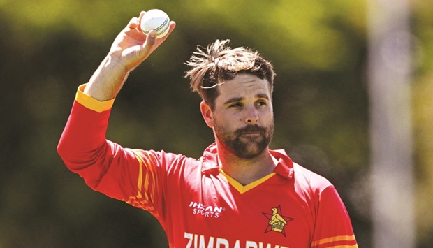 Zimbabweu2019s Ryan Burl acknowledges the crowd after taking five wickets during the third one-day  international against Australia at the Riverway Stadium in Townsville yesterday. (AFP)
