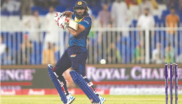 Sri Lankau2019s Bhanuka Rajapaksa plays a shot during the Asia Cup Twenty20 match against Afghanistan at the Sharjah Cricket Stadium in Sharjah yesterday. (AFP)