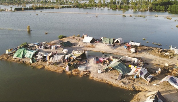 This aerial photograph shows makeshift tents for people displaced due to the floods after heavy monsoon rains at Sohbatpur in Jaffarabad district of Balochistan province yesterday. (AFP)