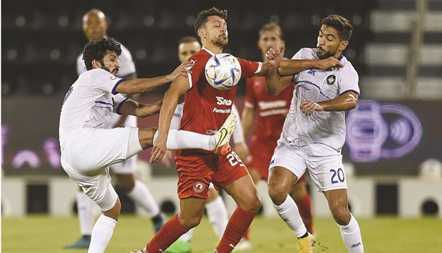 Al Arabiu2019s Youssef Msakni (centre) vies for the ball with Al Sailiya players during the QNB Stars League at the Jassim Bin Hamad Stadium yesterday. PICTURES: Noushad Thekkayil