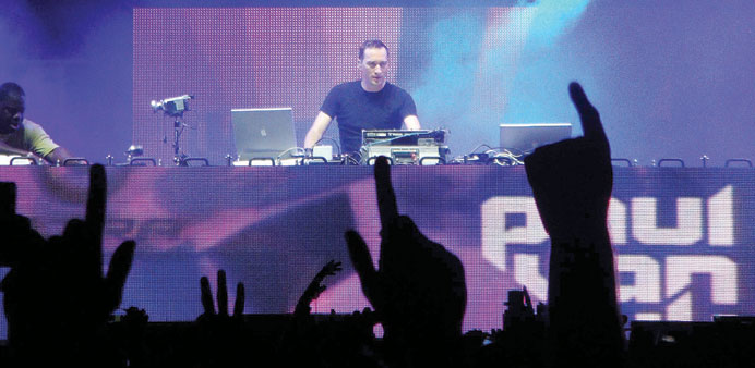 TUNE IN: DJ Paul van Dyk performs at an electronic dance event.                               