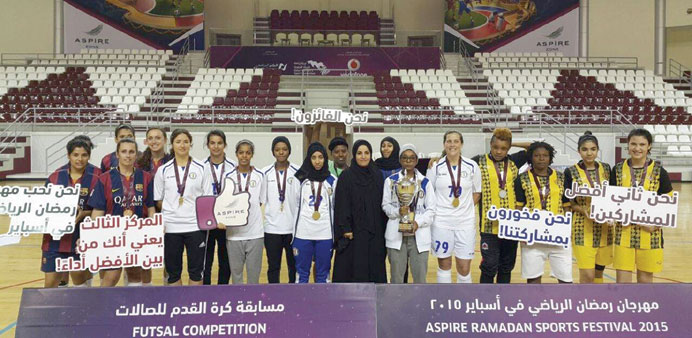 Top three finishers of the Ladies Futsal tournament at Aspire Zone Foundation Ramadan Sports Festival.