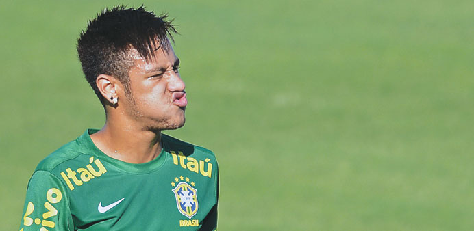 Brazilu2019s Neymar takes part in a training session at President Vargas stadium in Fortaleza, Ceara, Brazil yesterday. (AFP)