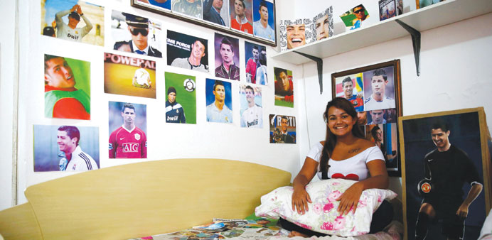 20-year-old Yasmine Cesar poses in her house in Manaus. (Reuters)
