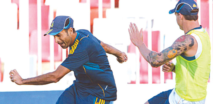 South African captain AB de Villiers (L) and Jean-Paul Duminy (R) play football during a training session in Sharjah yesterday.