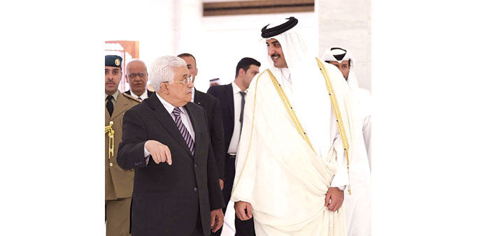  HH the Emir Sheikh Tamim bin Hamad al-Thani  with Palestine President Mahmoud Abbas in Doha yesterday.