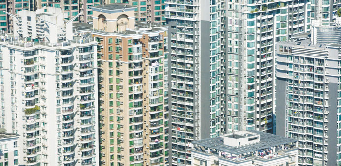 Residential buildings are seen in  Tianhe district of Guangzhou.  Home prices in many Chinese cities have continued to set records in the past year de