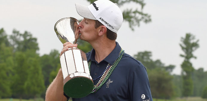 Justin Rose of England poses with the trophy after winning the Zurich Classic of New Orleans at TPC Louisiana on Sunday in Avondale, Louisiana.