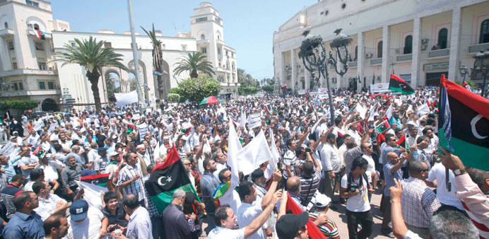 Protesters gather in Tripoliu2019s Algeria Square yesterday.