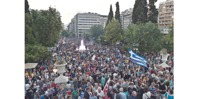 Protesters participate in a u2018Vote Nou2019 demonstration in front of the Greek parliament in Athens.