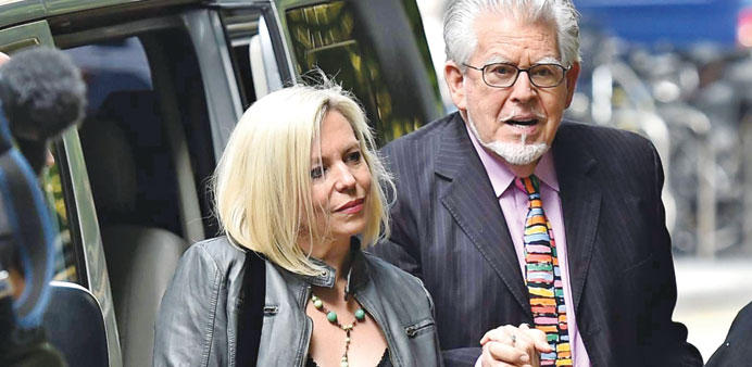 Veteran Australian artist and entertainer Rolf Harris arrives with his daughter Bindi at Southwark Crown Court in central London yesterday to attend h