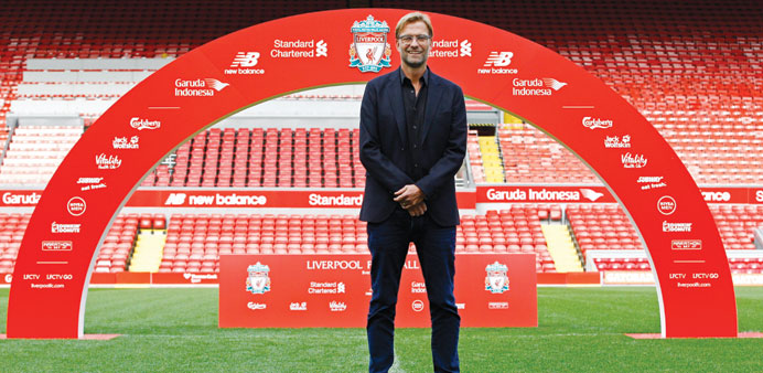 New Liverpool manager Jurgen Klopp poses after the press conference yesterday.