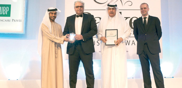 First Finance Company officials receiving the award at the Dubai ceremony.