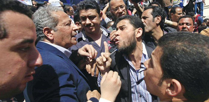 Journalists argue with members and supporters of the Press Syndicate during a protest against the Interior Ministry at the Press Syndicate in Cairo.