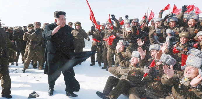 Kim Jong-Un greets Korean Peopleu2019s Army pilots at the summit of Mt Paektu.