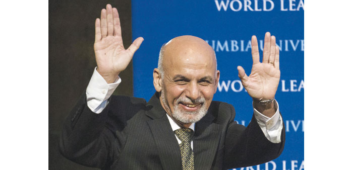 Ashraf Ghani gestures as he enters before participating in a discussion at Columbia University in New York. 