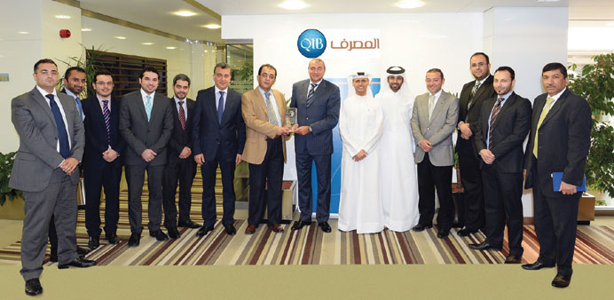 QIB officials receiving the World Finance Award.
