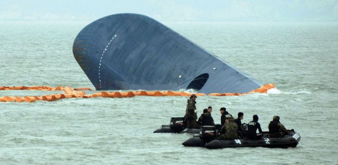 A file photo of the South Korean coast guard searching for passengers near the Sewol ferry.
