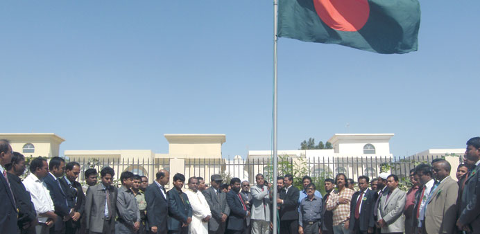 The national flag of Bangladesh being hoisted during the function at the embassy.