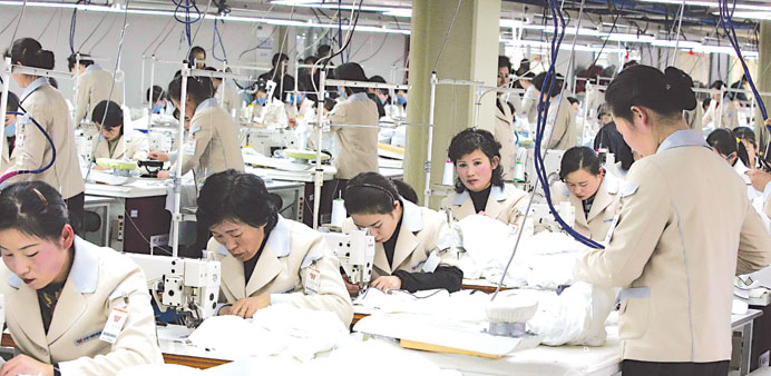 File picture shows North Korean workers at the Kaesong joint industrial complex in North Korea. South Korea will advise workers to withdraw from the i