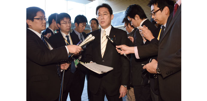  Foreign Minister Kishida answers questions after a cabinet meeting yesterday at the prime ministeru2019s official residence in Tokyo.