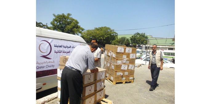Officials checking the medical supplies.