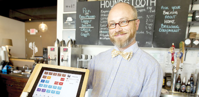 * Barista Rudi Miller at Houndstooth Coffee in Austin, Texas, which is one of several area retailers using the Square mobile payments technology.