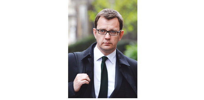 Former News of the World editor Andy Coulson arrives at the Old Bailey Central Criminal Court in London yesterday.