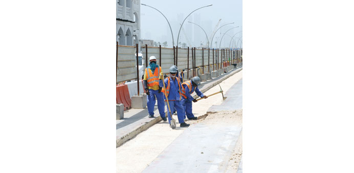 Men working at a road project in Doha. PICTURE: Thajuddin