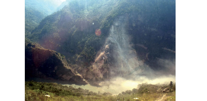 This handout photograph released by the Nepal army yesterday, shows an area in Nepalu2019s mountainous northwest Myagdi district affected by a landslide. 