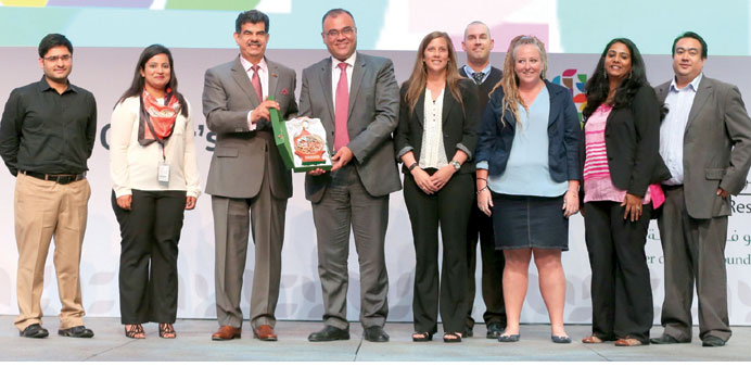 Researchers from Texas A&M University at Qatar receiving the award