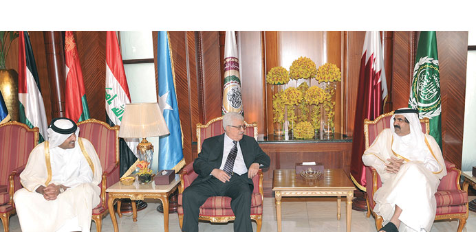 HH the Emir Sheikh Hamad bin Khalifa al-Thani and HH the Heir Apparent Sheikh Tamim bin Hamad al-Thani with Palestinian President Mahmoud Abbas