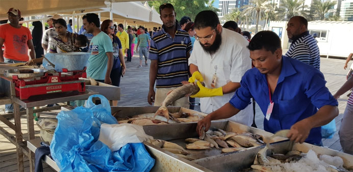  tInspection under way at the Doha Corniche fish market.