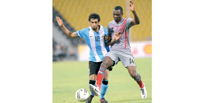 Al Wakrah and Lekhwiya players vying for the ball during their Sheikh Jassim Cup match on Sunday.