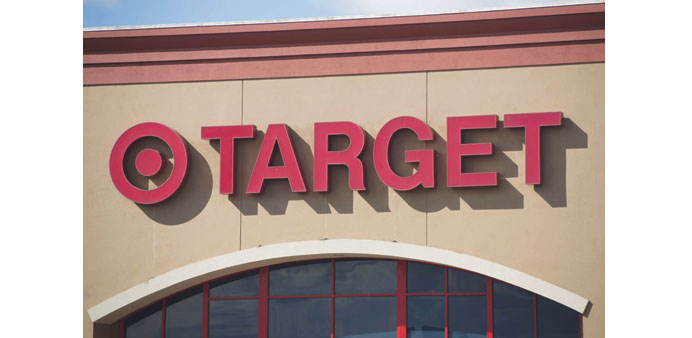 A Target logo is seen on its department store in Springfield, Virginia. Target yesterday said it would slash thousands of jobs as it restructures to s