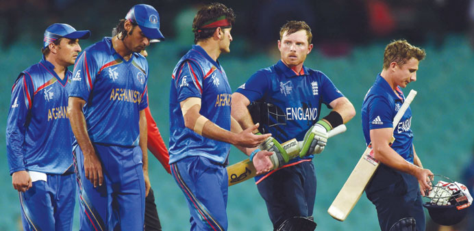Englandu2019s batsman Ian Bell (right) talks to Afghanistan player Hamid Hassan as they walk off the field after the game at the Sydney Cricket Ground yes