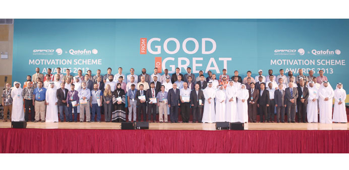 A group photo of Qapco employees.