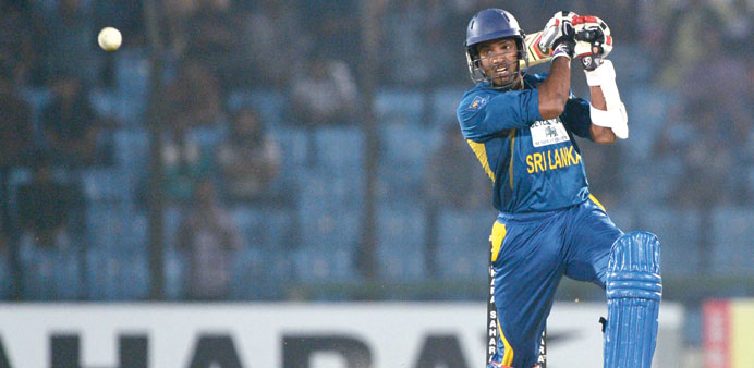 Sri Lankan cricketer Sachithra Senanayake hit the winning runs against Bangladesh in the second T20 match yesterday.  (AFP)