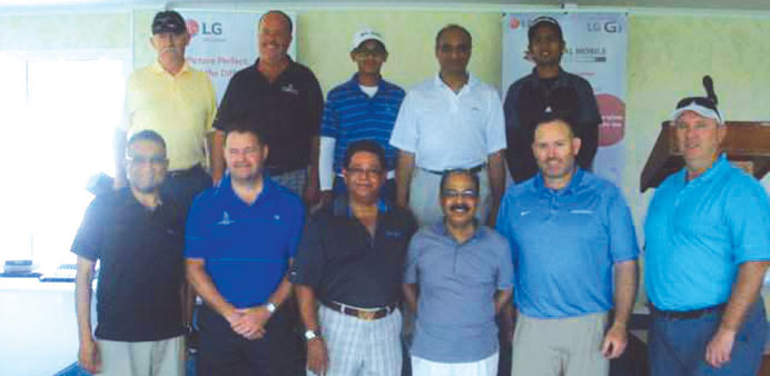 Participants at the Jumbo Electronics golf tournament.