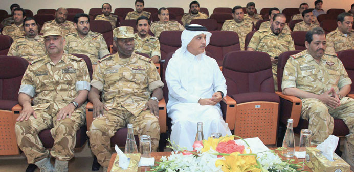   HE the Minister of Finance Ali Sherif al-Emadi with the officials of the Joaan bin Jassim Joint Command and Staff College.
