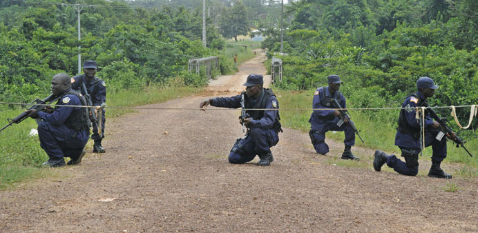 A Liberian Rapid Response Unit patrols near Toe Town on the border with Ivory Coast.