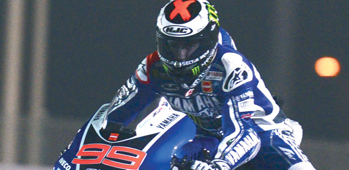 Spanish Yamaha rider Jorge Lorenzo devours the track on way to the pole position in Losail yesterday.