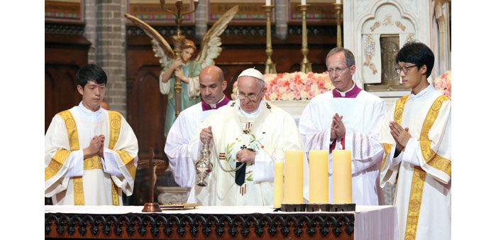 Pope Francis leads a Mass for peace and reconciliation on the Korean Peninsula at the Myeongdong Cathedral in Seoul yesterday.