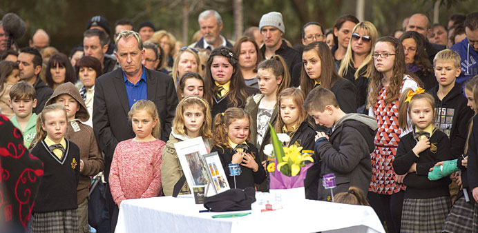 Relatives and friends of the van den Hende family gather at the Eynesbury community, 50km west of Melbourne, for a memorial service for five members o
