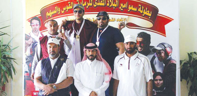 Winners of the HH The Emir Shooting Championships pose with their medals.